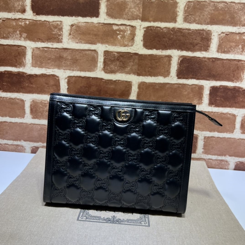 G*u*i clutch bags